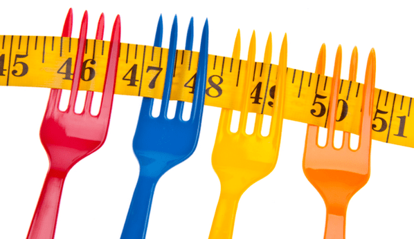 centimeter na vilicah simbolizira hujšanje na Dukanovi dieti